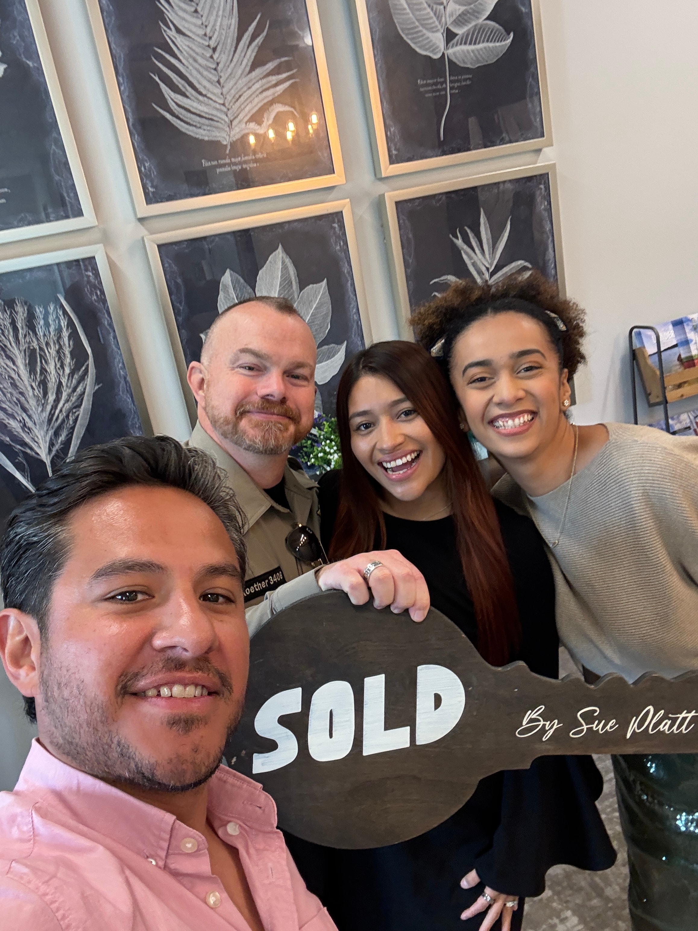 Eddie Gamez and Sue Platt closing celebration with clients